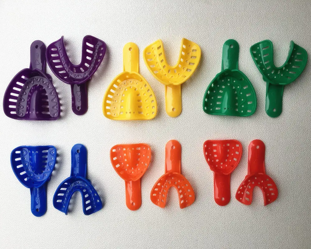 Bandejas de impresión de plástico para adultos y niños, material Dental de 12 piezas colores, como se muestra en la imagen