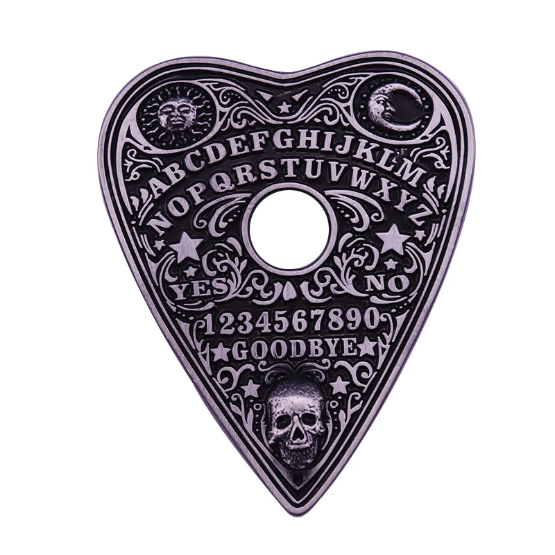 Ouija Planchette Engraved Pin In the shadows, the gates to the underworld dwell-a mystical dimension only a select few can tell.