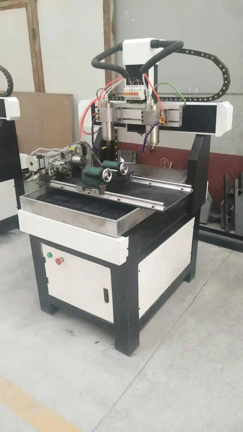 Song li CE certified multifunctional small 4060 CNC engraving machine 2.2KW double rotating shaft