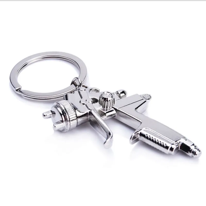 2024 new creative car paint spray gun model keychain charm fashion men and women car bag keychain accessories gift wholesale