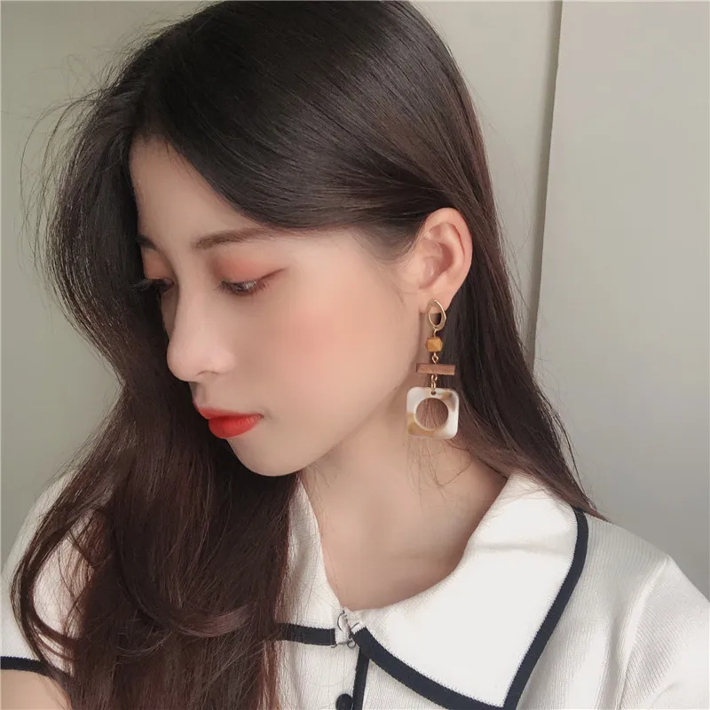 South Korea's temperament style restoring ancient ways show face little joker hollow rectangular geometry resin earrings