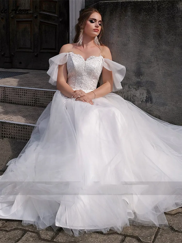 Sweetheart abito da sposa bianco Appliques di pizzo alto spaccato Organza Cap maniche abito da sposa lungo fino al pavimento Robe De Mariee nuovo arriva