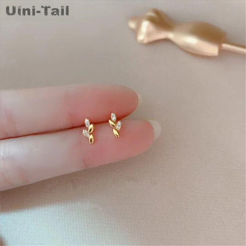 Uini-Tail hot new 925 Tibetan silver leaf earrings fashion simple compact dynamic personality wild leaf earrings JK123