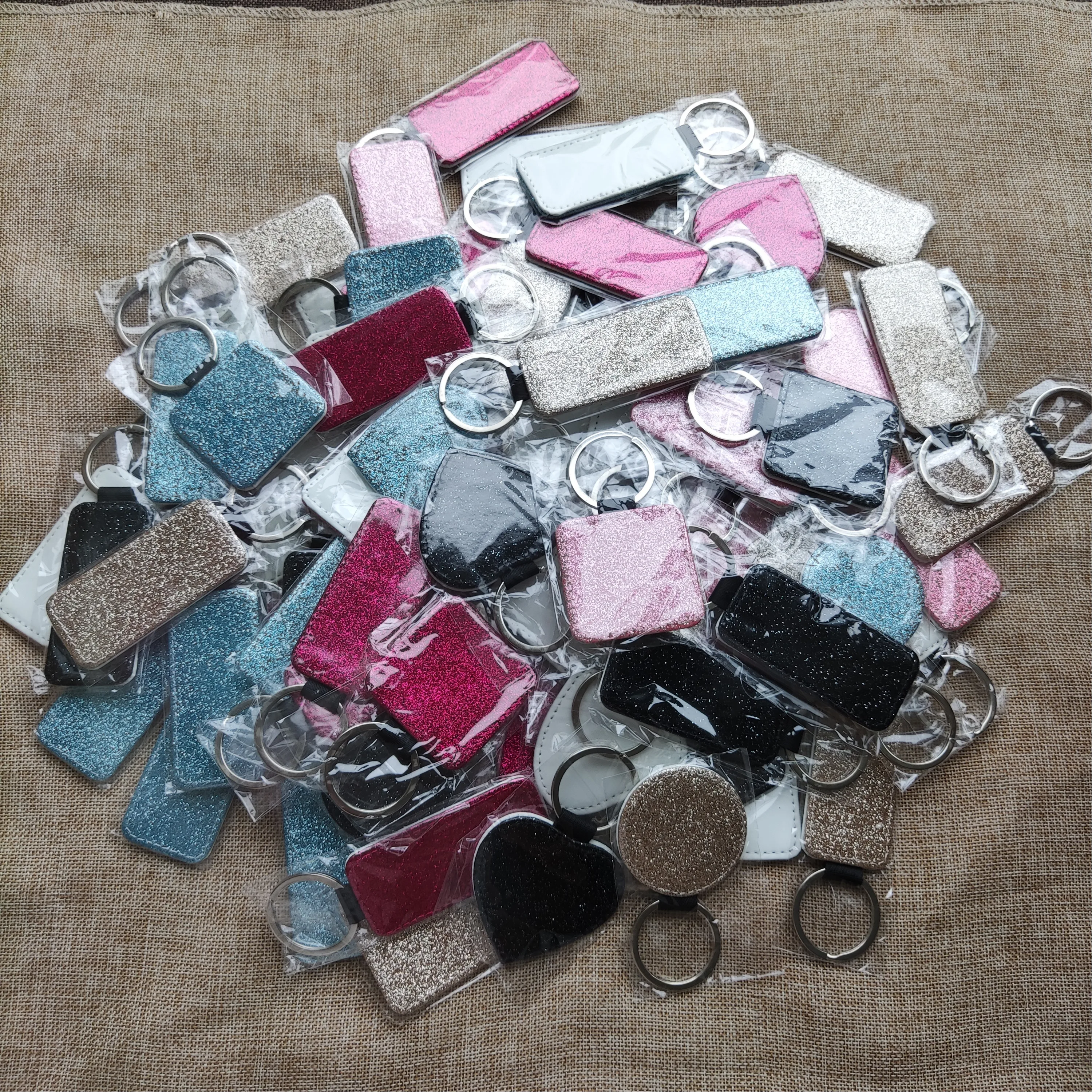 

100pcs/lot Sublimation Blank Bling Leather Pendant Tags Key Chains Key Ring for Sublimation ink Transfer Print