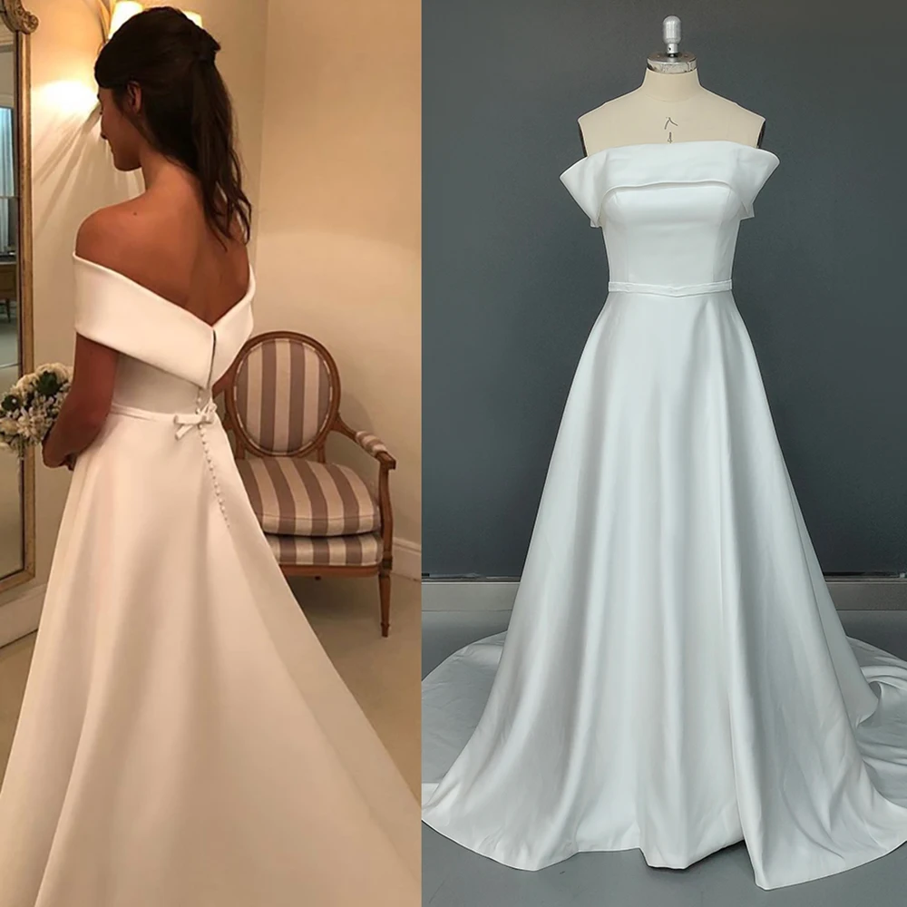 Off Shoulder Plain Satin Wedding Kathedraal Jassen Met Trein Low Cut Knoppen Mouwloze Custom Made Simple Elegant Bridal Dress