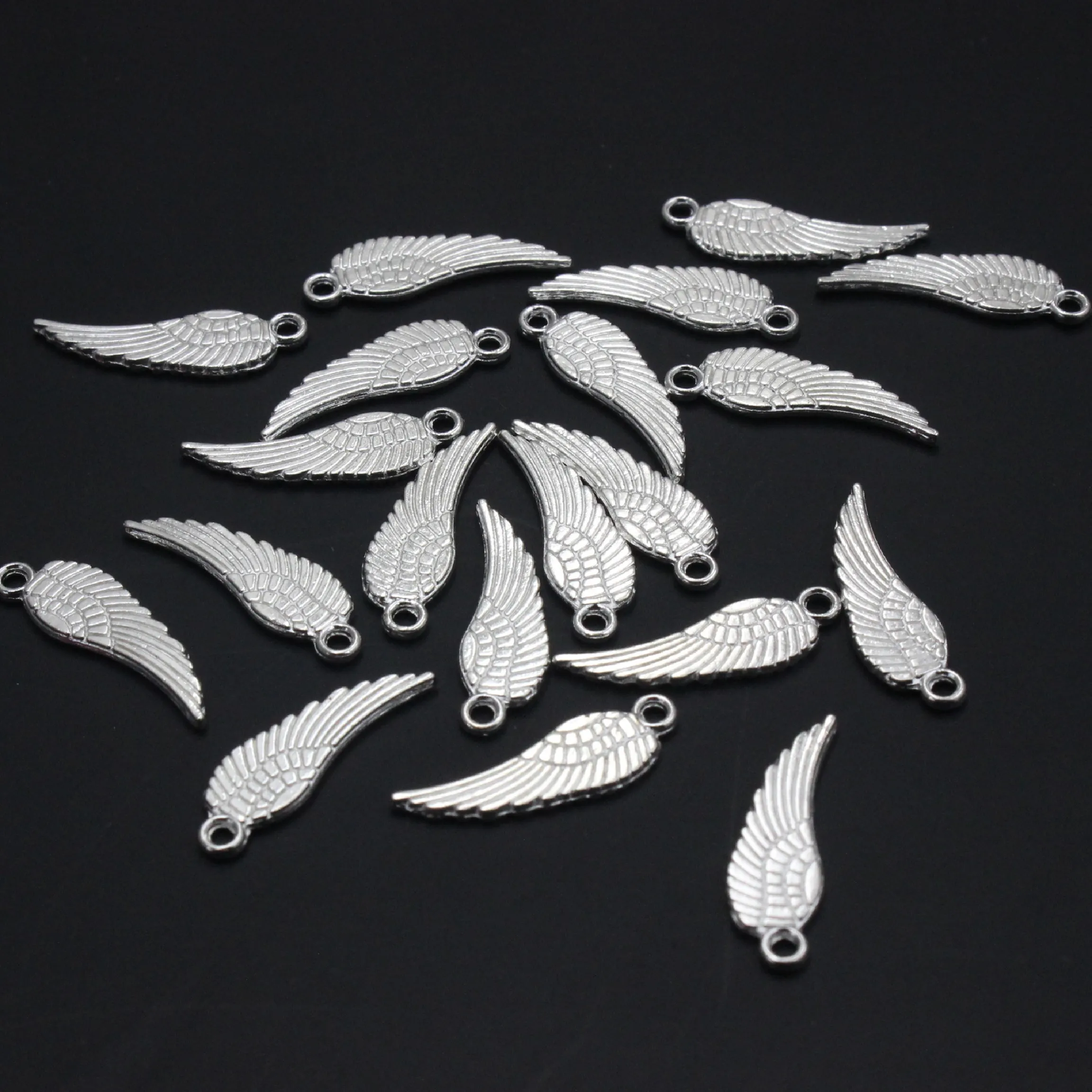 Onebeading 100pcs Tibetan Silver Wings Pendant Charms Beads 5x16.5mm (K00108)