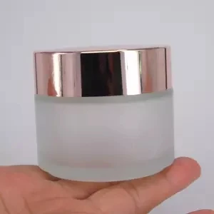 

Wholesale 3 oz Frosted Glass Cream Car 50g 100g Transparent Glass Cosmetic Cream Jar With Rose Gold Aluminum Lids