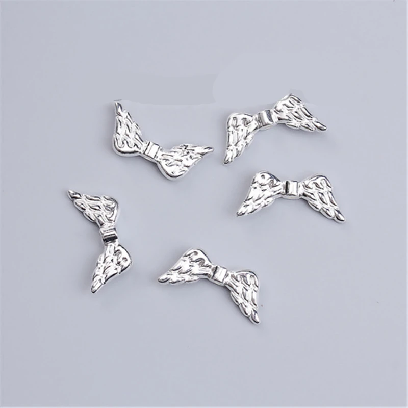 DoreenBeads 10 PCs Zinc Based Alloy Spacer Wing Beads silver color DIY Findings 19mm( 6/8\