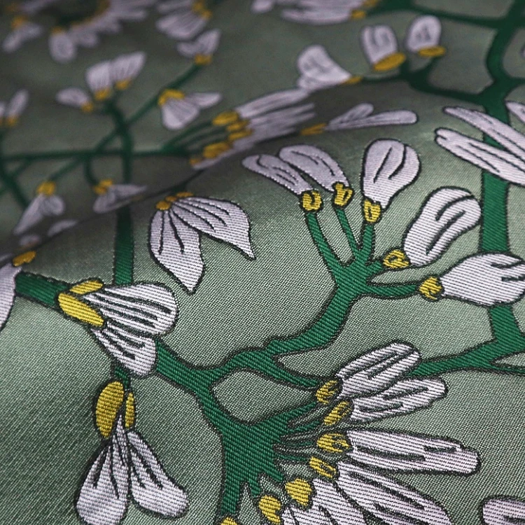 Elegant daffodil three-dimensional yarn-dyed jacquard fashion fabric, sewing fabric factory shop is not out of stock