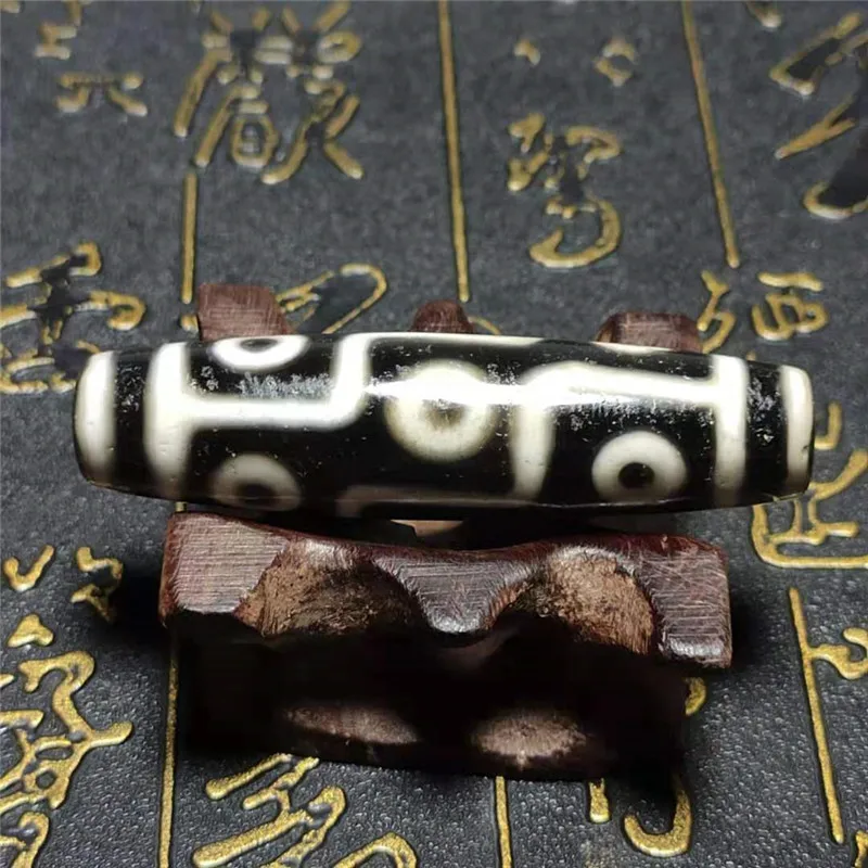 

Black and White Treasure Magic Power Tibetan Old Agate Baojiang 9 Eyes dZi Bead 57mm*14mm High Quality