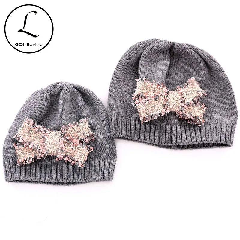 

Cute Nebworn Baby Bow Knit Hat Winter Boys Girls Toddler Infant Kids Soft Cotton Bowknot Tassel Skullies Beanies hats Girls Cap