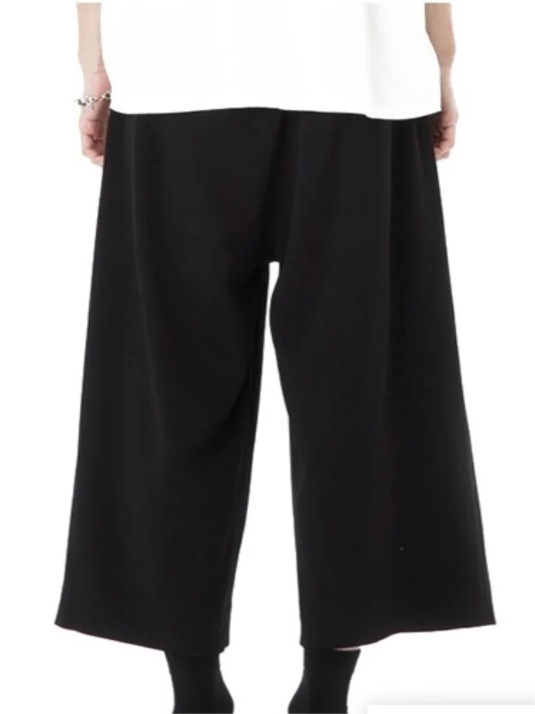 Spring and summer new men's leisure wide leg pants culottes pure color super loose cool nine minutes belt decoration