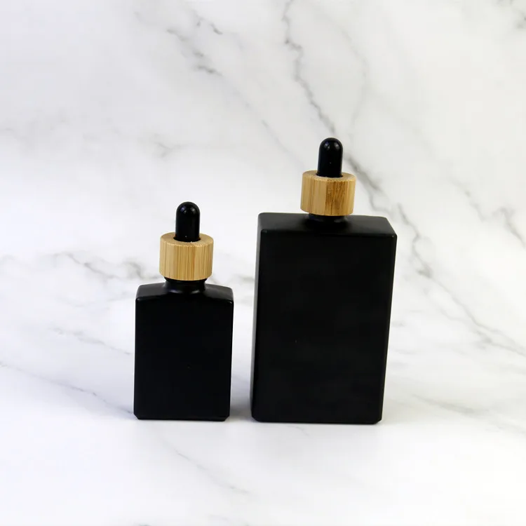 

30ml 50ml 100ml Matte Black Rectangular Square Glass Dropper Bottles With Container Bottle Packaging Bamboo Wood dropper Lid Cap