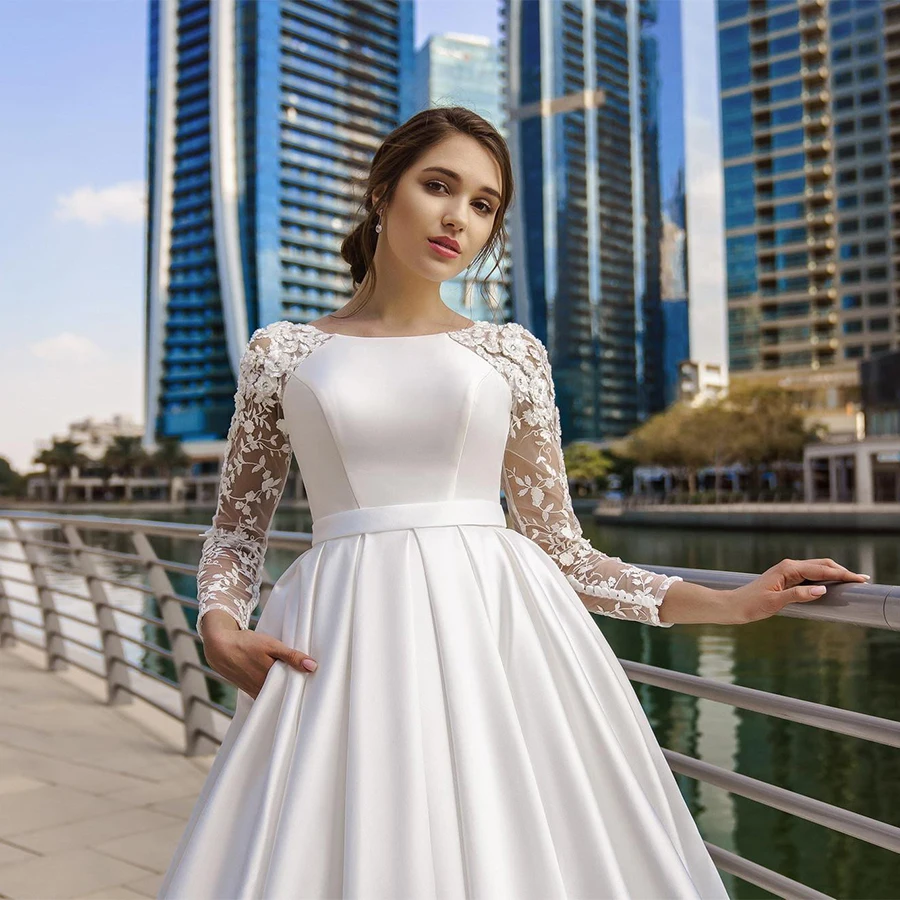 Elegante con abito da sposa musulmano in raso tascabile maniche lunghe scollo tondo Applique in pizzo abiti da sposa A-line Vestido De Novia