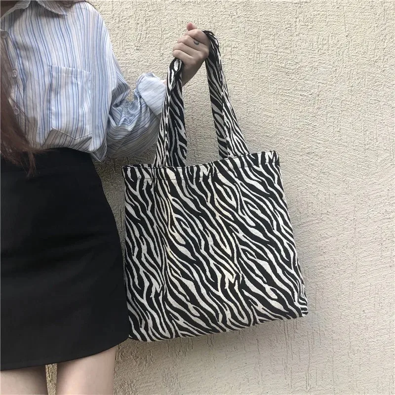 Bolso de mano de lona de cebra de gran capacidad para mujer, bolso de hombro de lujo, bolso de compras, bolso de mano informal de viaje para axilas