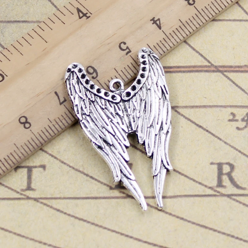 10 sztuk Charms Angel Wings 39x24mm tybetański brąz srebrny kolor zawieszki antyczne tworzenia biżuterii DIY Handmade Craft wisiorek