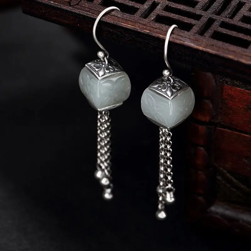 

Independent design retro style inlaid Hetian white jade pattern tassels for ladies high-end earrings elegant silver jewelry