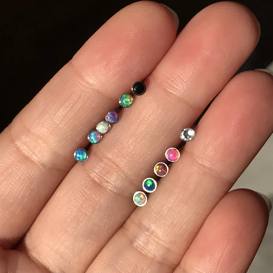 Perché il treale viola in acciaio inossidabile è la scelta perfetta per i piercing del labbro e dell’orecchio
