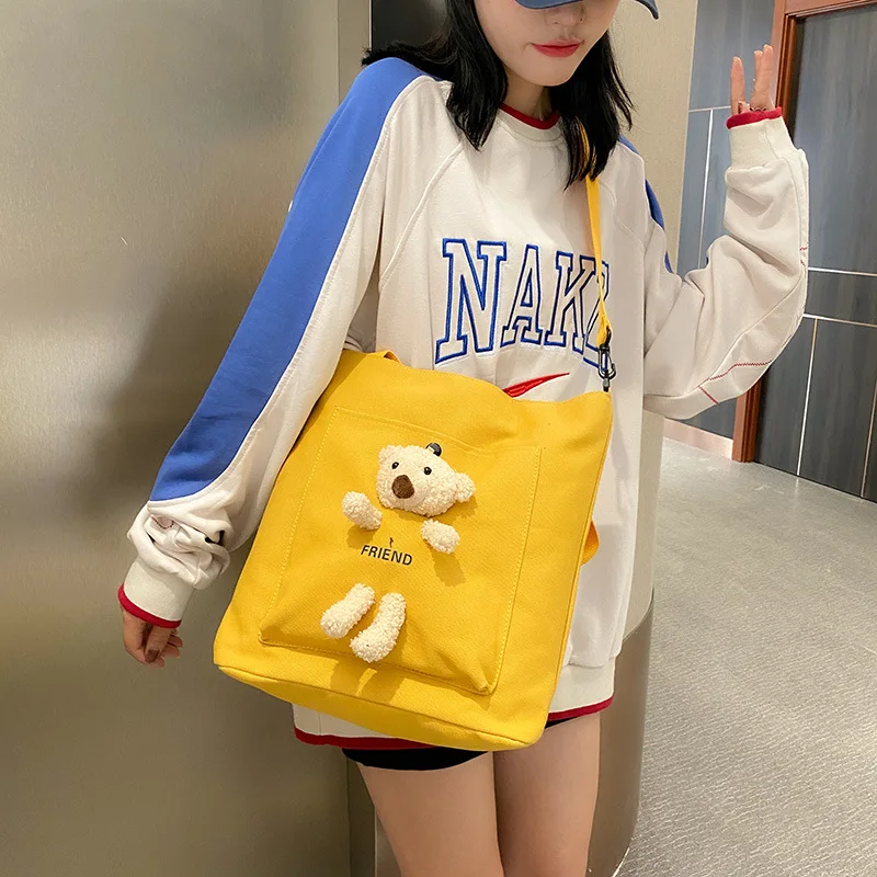 

Bag girl 2022 new large canvas messenger bag female student Korean ins Japanese cute bear handbag. purses and handbags