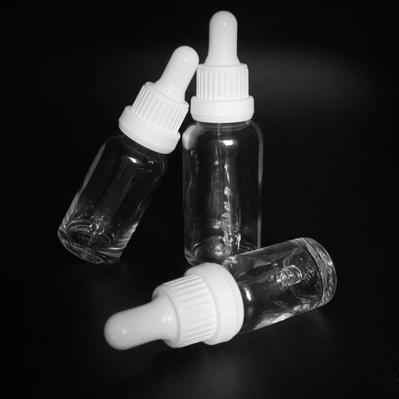 Coperchio bianco in vetro trasparente contagocce 10ml 15ml 30ml liquido per aromaterapia per Pipette di olio essenziale per massaggio bottiglie riutilizzabili