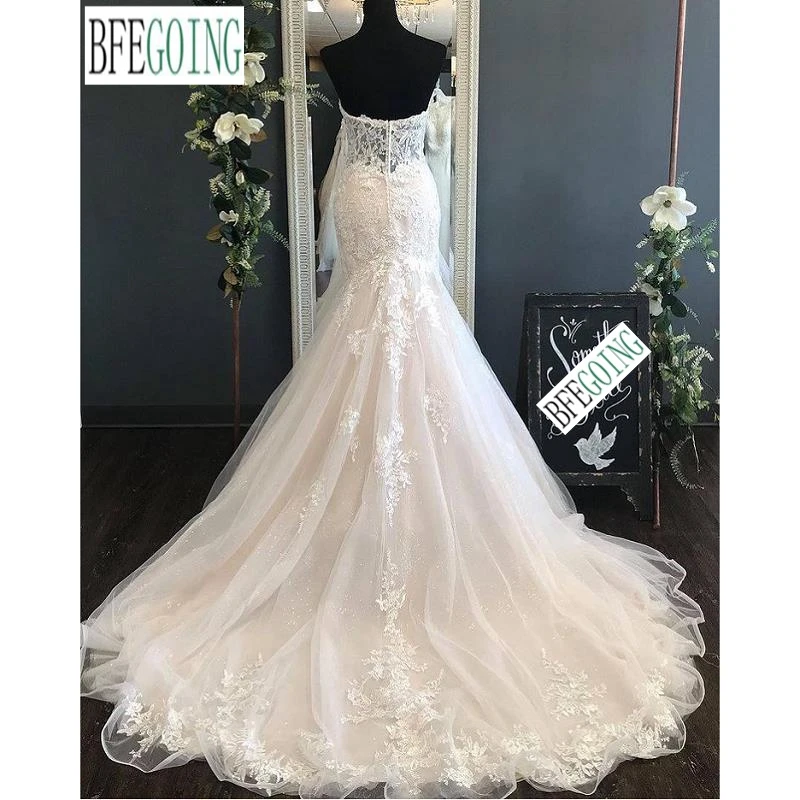 Laço tule sereia/trompete vestidos de casamento capela trem feito sob encomenda floor-length querida vestidos de noiva sem alças