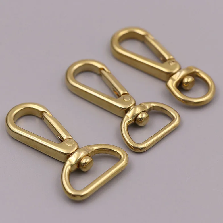 

Brass eye hook and rotatable clip trigger clasp for leather craft strap