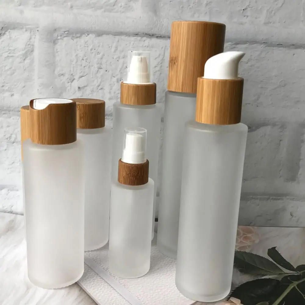 

50pcs Wholesale cosmetic containers wholesale 30ml 50ml 100ml 120ml 150ml frosted glass bottle travel bottle bamboo pump top