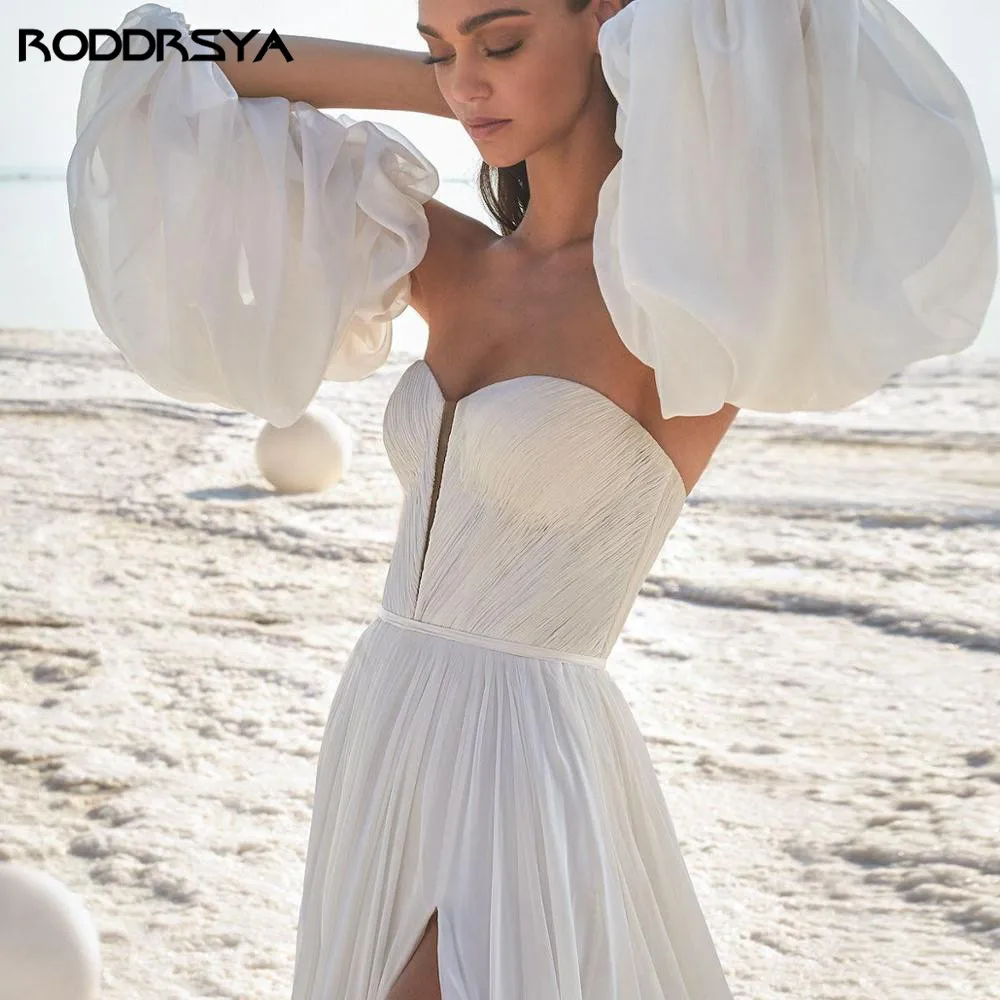 RODDRSYA Boêmia praia de casamento de manga longa e flácida de neve doce vRODDRSYA Boho Vestidos De Casamento Praia Longo Puffy Mangas Chiffon Querida Vestido De Casamento Varrer Trem Custom Made Split Vestido De Noiva