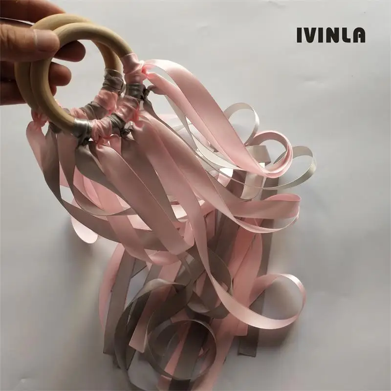 20pcs/lot pink and grey Wooden Ring Waldorf Ribbon With Bell Hand Kite Toy FLY ME Birthday Party