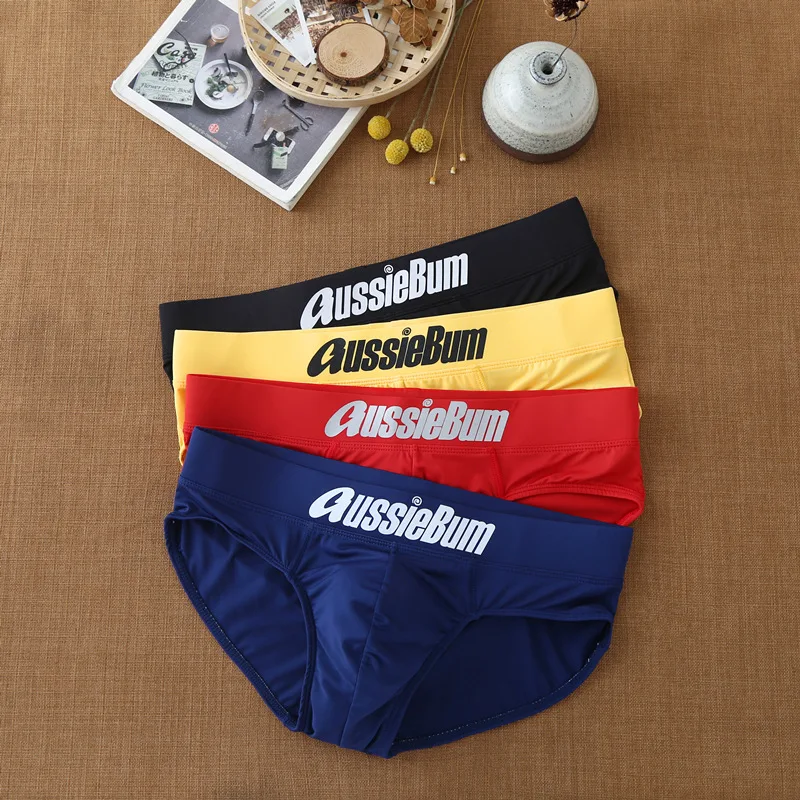 Men's triangle underwear with milk silk low waist elastic bag