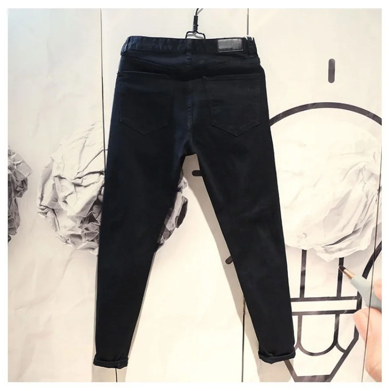 

Street Fashion Mens Jeans Personality Slim Fit Hole Ripped Rivets Biker Black Denim Pencil Pants New Casual Male Autumn Trousers