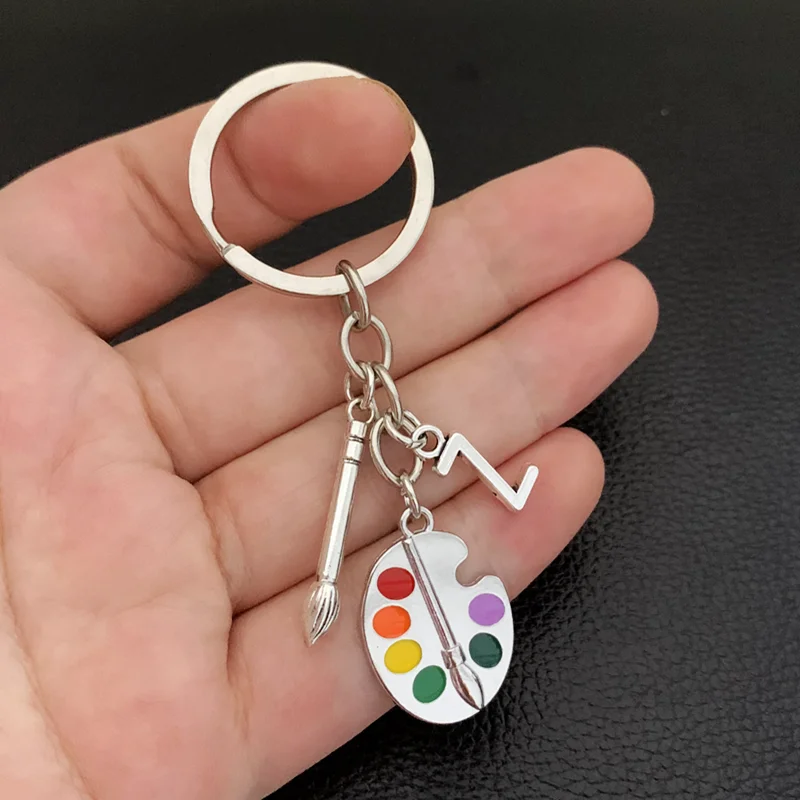 1 Uds paleta de pintor herramienta ovalada pincel colores llavero dibujar letra A-Z llavero entrepreneurial regalo personalizado para pintor