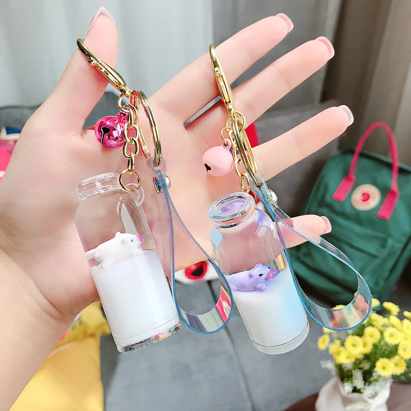 2023 Floating Creative Cute Piggy Milk Bottle Keychain Moving Liquid Quicksand Drift Bottle Keyring For Women Bag Pendant D559