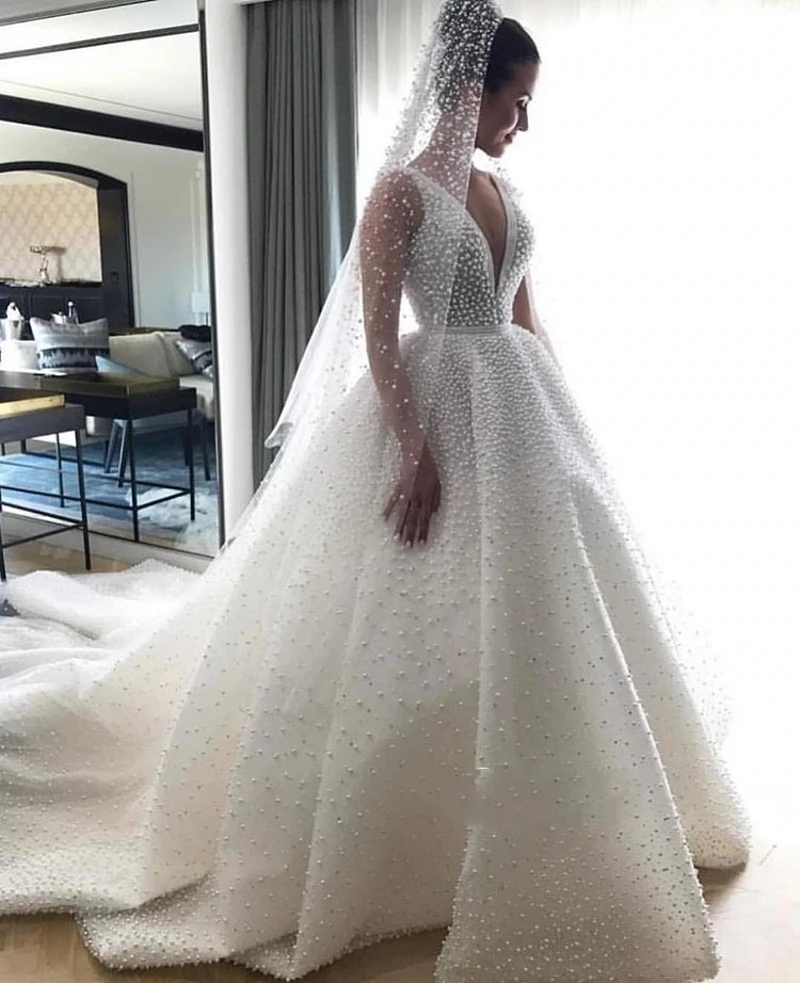 

Dubai Africa New Elegant V-Neck Sleeveless Wedding Dresses 2025 Princess Pearls Bride Gowns Robe De Mariee
