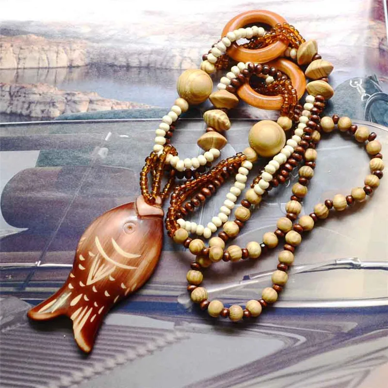 Magic Sun lines Hand Carved Exotic Hollow Round Woody Beaded Pendant Necklace Fashion Jewelry for Women Birthday Gift Present