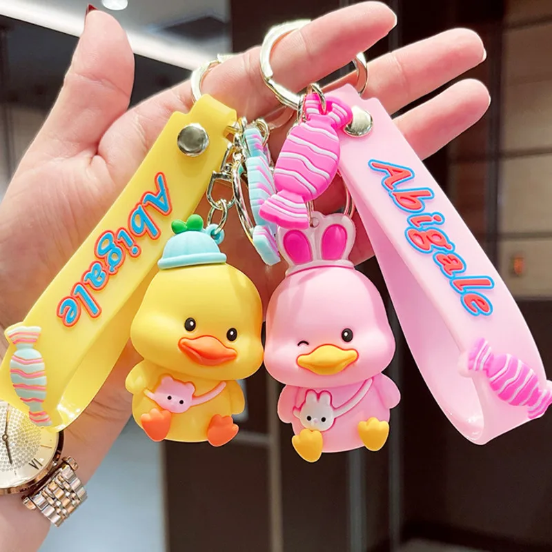 PVC Satchel Duck Keychain Cute Creative Yellow Pink Duckling Candy Trinket Car Keyring Schoolbag Pendant Soft Rubber Doll