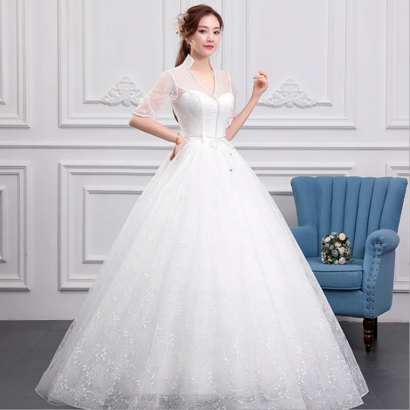 Robe de mariée, col en v, demi-manches, filet, glands, ceinture, lacets, ligne a, robe de bal