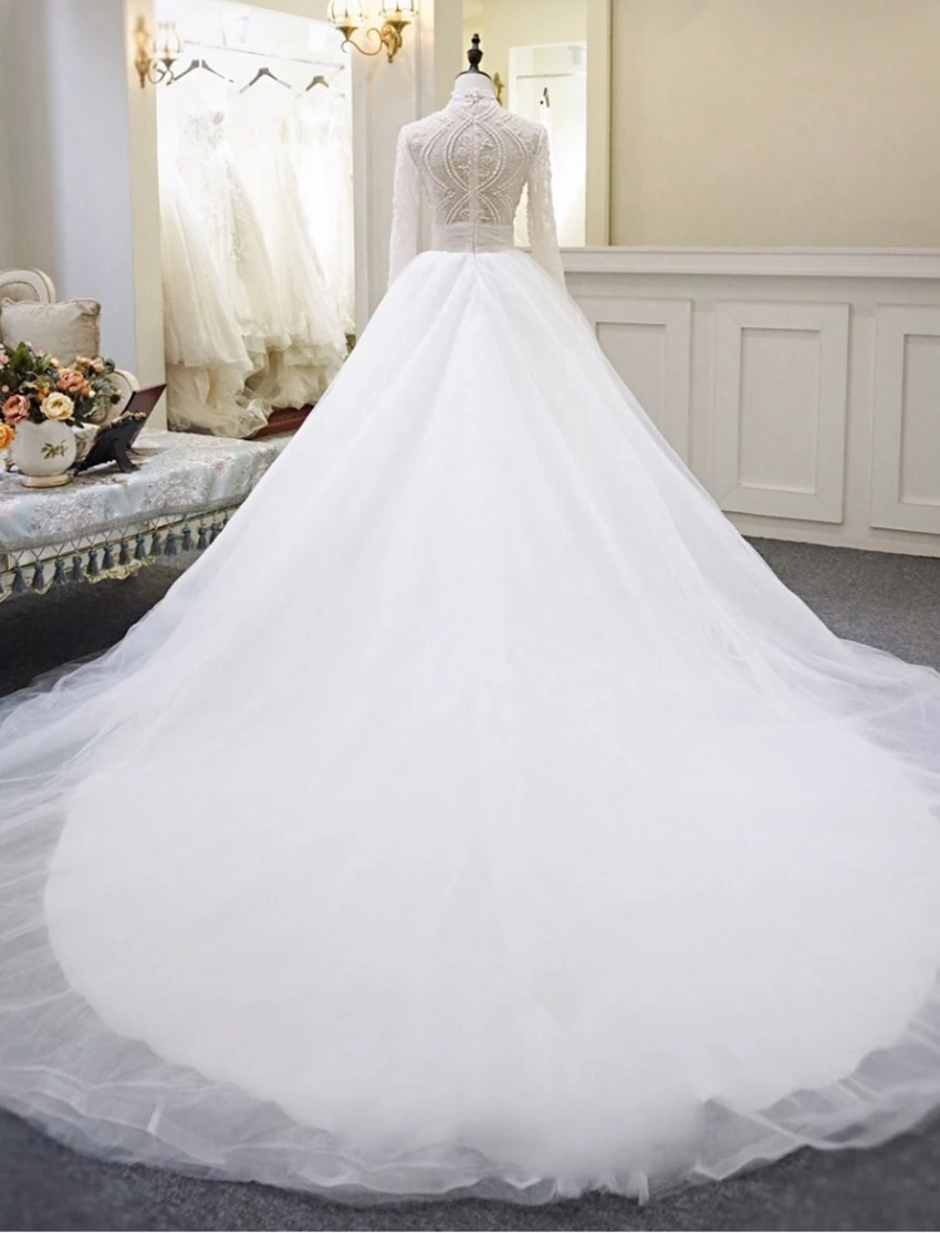 Light luxury bridal wedding dress, new tail princess dream super fairy, long-sleeved European beauty and pearl sewing ha19