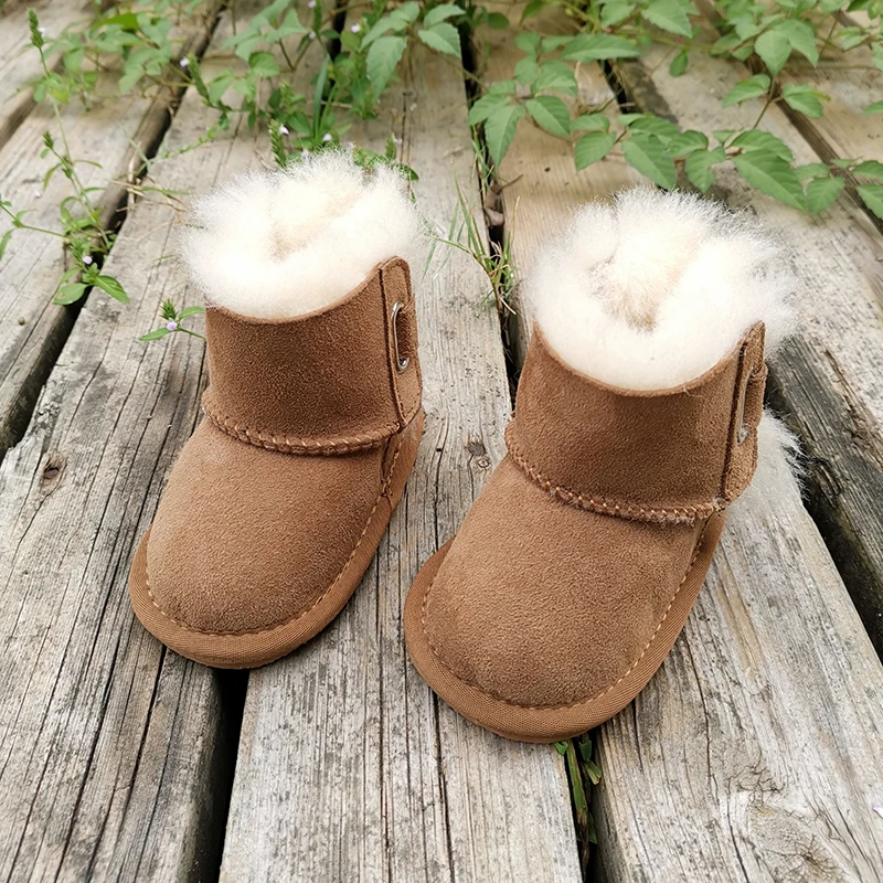 Zapatos de piel de oveja para bebé, botas para niño y niña, diseño de lujo para evitar resbalones, de lana cálida