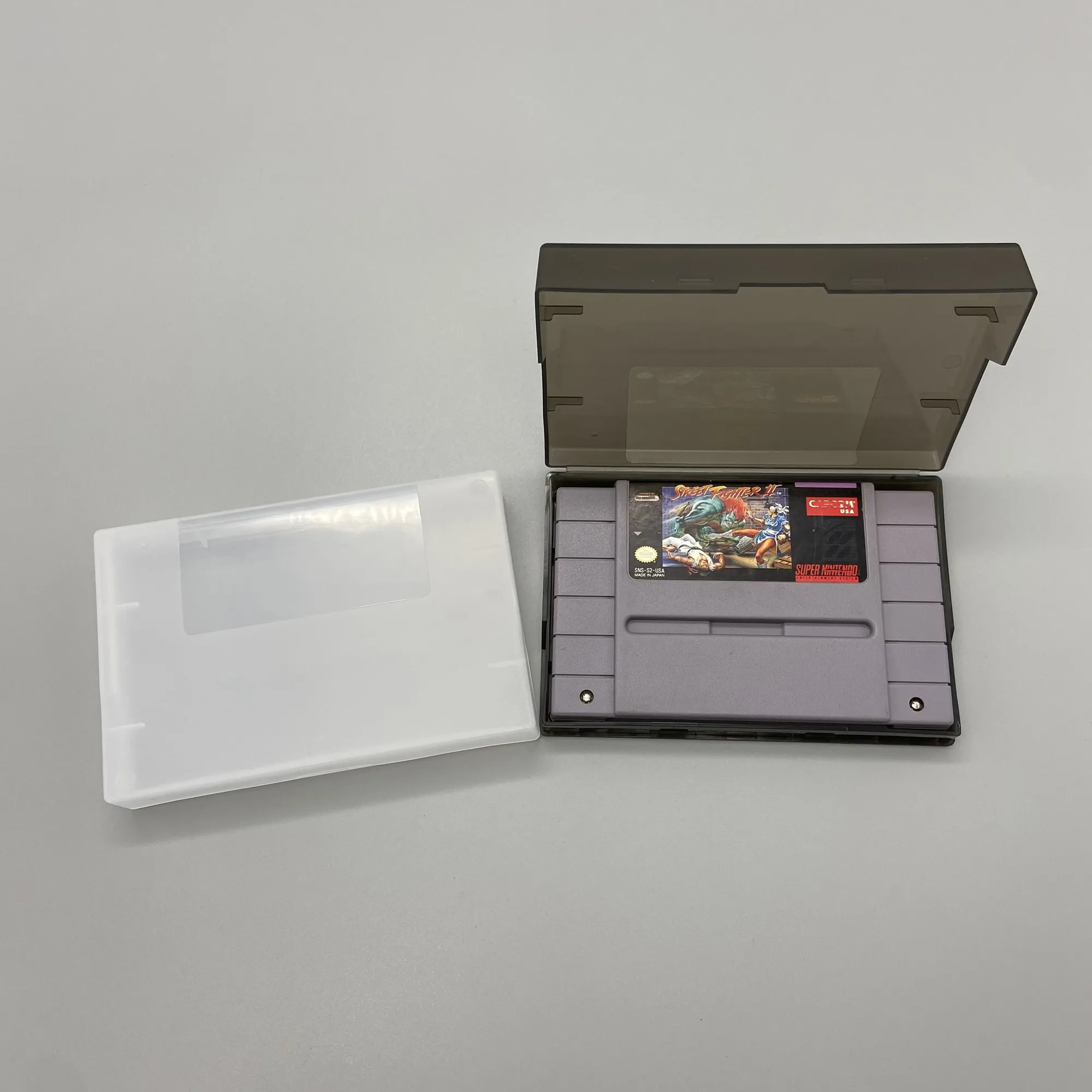 

10 pcs a lot Game Card storage box case Transparent shell for SNES & SFC for Super Famicom Game US version