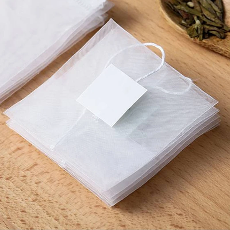 100Pcs/Lot Nylon Tea Bags Filter Folded Empty Scented With White Tag for Herb Loose 6.5*6.5cm