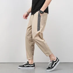 Pantalones de empalme fino de 9 puntos para hombre, pantalón informal de seda de hielo con ventilación, tendencia de tubo recto, pierna elástica suelta, verano coreano