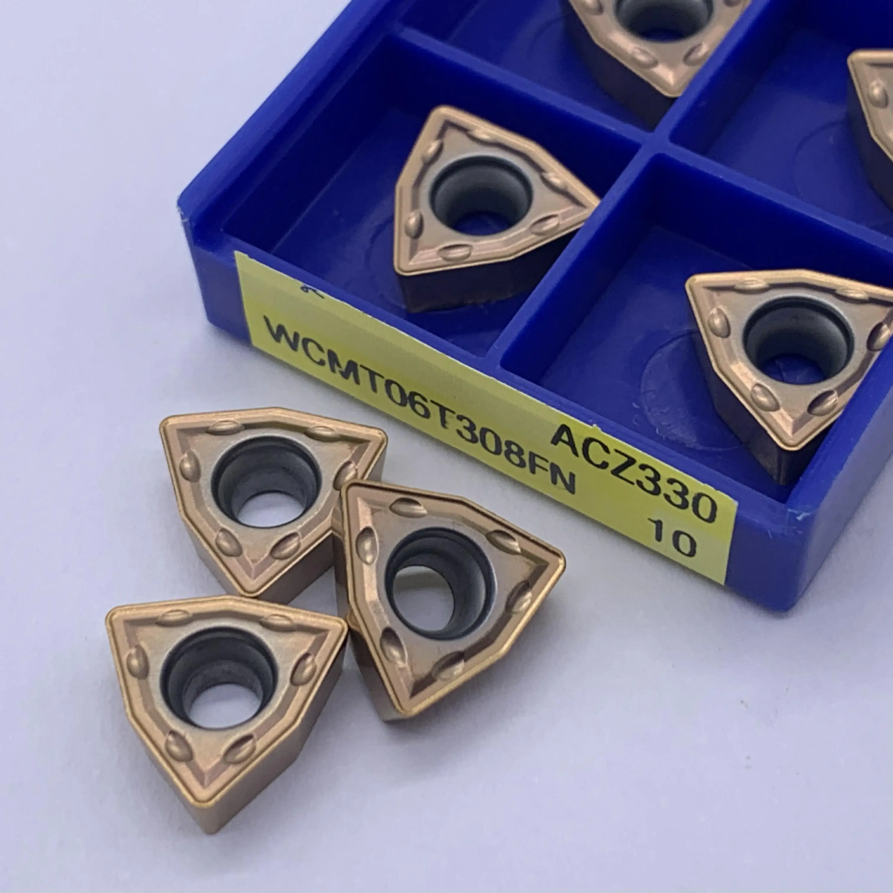 WCMX030208FN WCMX040208FN WCMT050308FN WCMT06T308FN WCMT080412FN كربيد أداة تحول إدراج آلة خرط تعمل بالتحكم الرقمي بواسطة الحاسوب