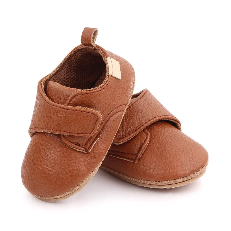 Zapatos de cuero PU para bebé, mocasines antideslizantes de goma, suela suave con gancho, para primeros pasos, de 0 a 18 meses, novedad de 2023