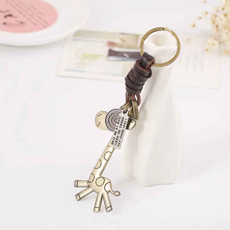 Porte-clés en cuir de girafe, rétro, mignon, pendentif de sac à dos de voyage pour hommes et femmes, porte-clés de voiture, cadeau de fête d'anniversaire