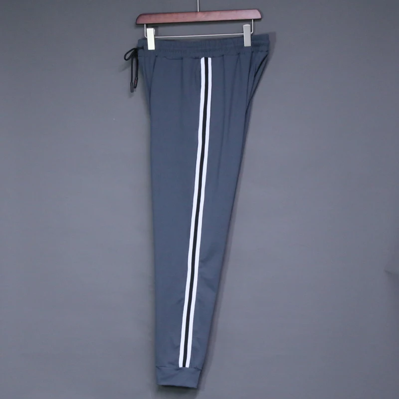 Pantaloni sportivi da jogging da uomo a righe elastiche termoretraibili Pantaloni sportivi da fitness per allenamento all\'aperto casual Pantaloni da