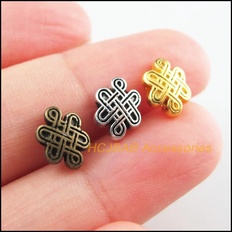 40 sztuk Retro tybetański srebrny odcień złoty postarzany kolor brązu chiński węzeł koraliki dystansowe Charms 7x10mm
