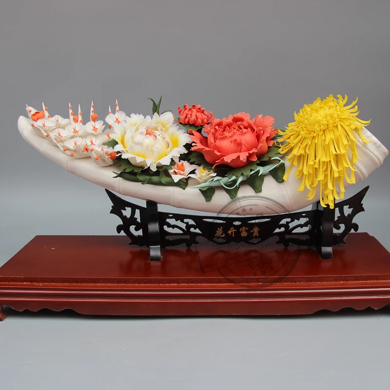 

Appearance modeling: plant tianchi ceramic sculpture art creative home decoration porcelain carving flowers and wealth