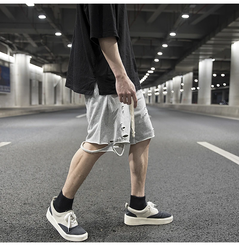 High street wind hole knife cut hem raw edge cotton shorts hip-hop style solid color wild summer skateboarding pants men