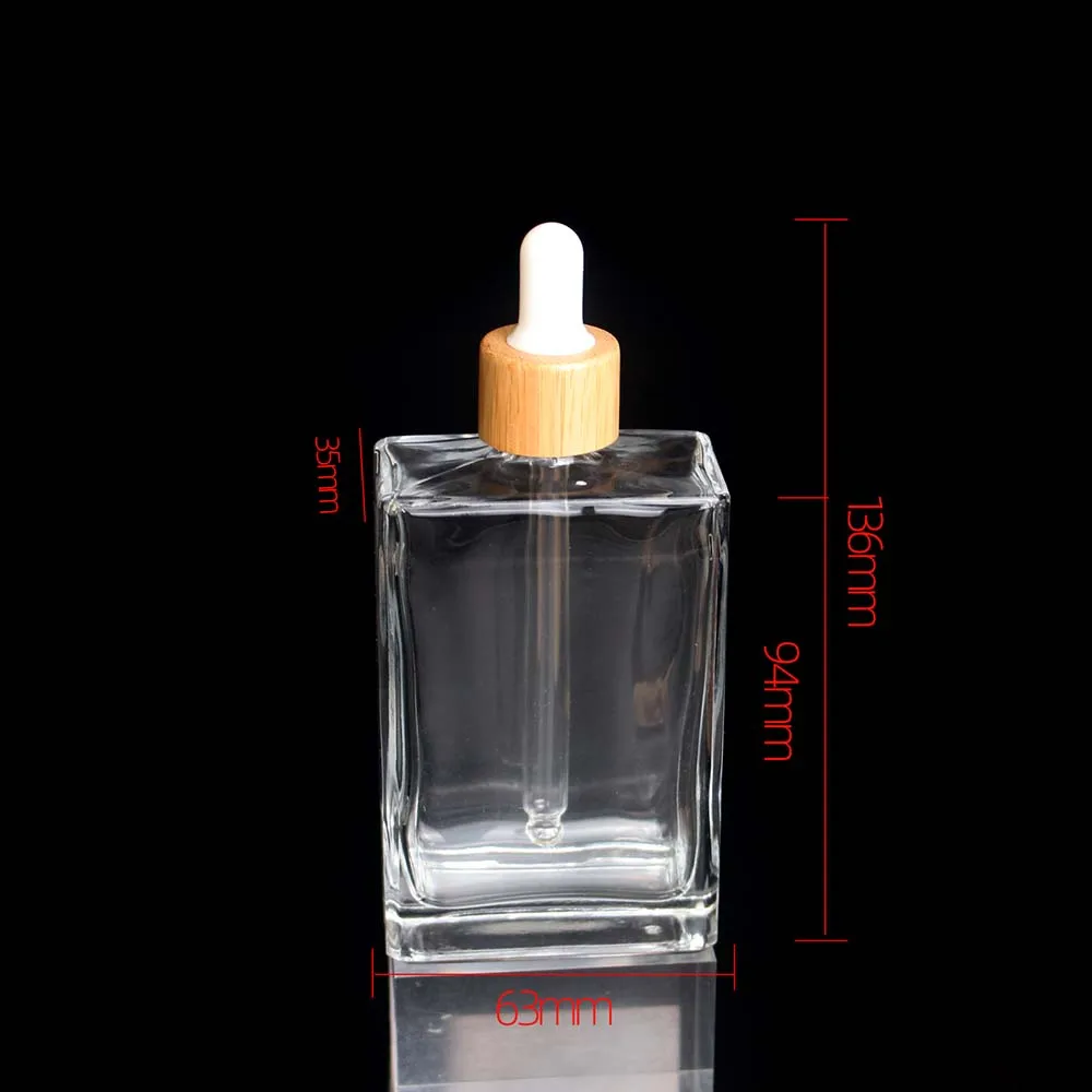 Spot Wholesale 100ml Square GlassTransparent Dropper Bottle Cosmetic Bamboo Cover Essential oil bottle container